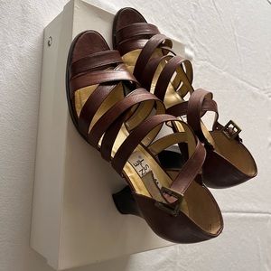 Brown leather high heels by Nine West. Size 8.